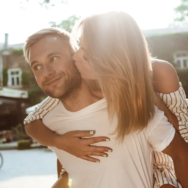 Long-term couple resting together with gentle closeness and trust
